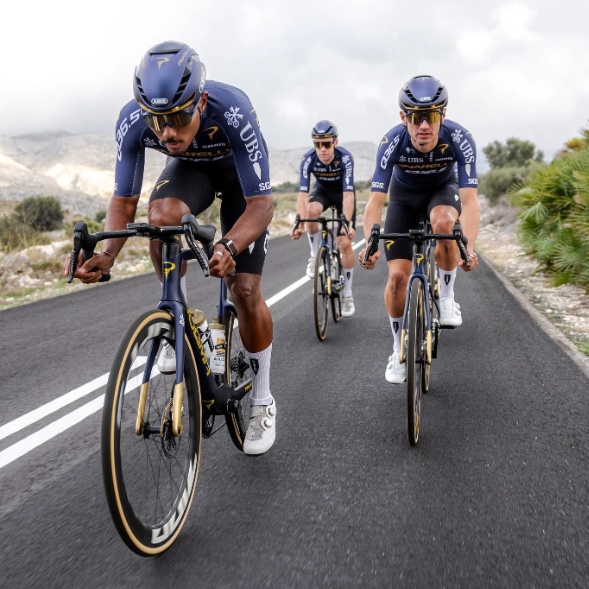 Q36.5 Pro Cycling Team riders on the road