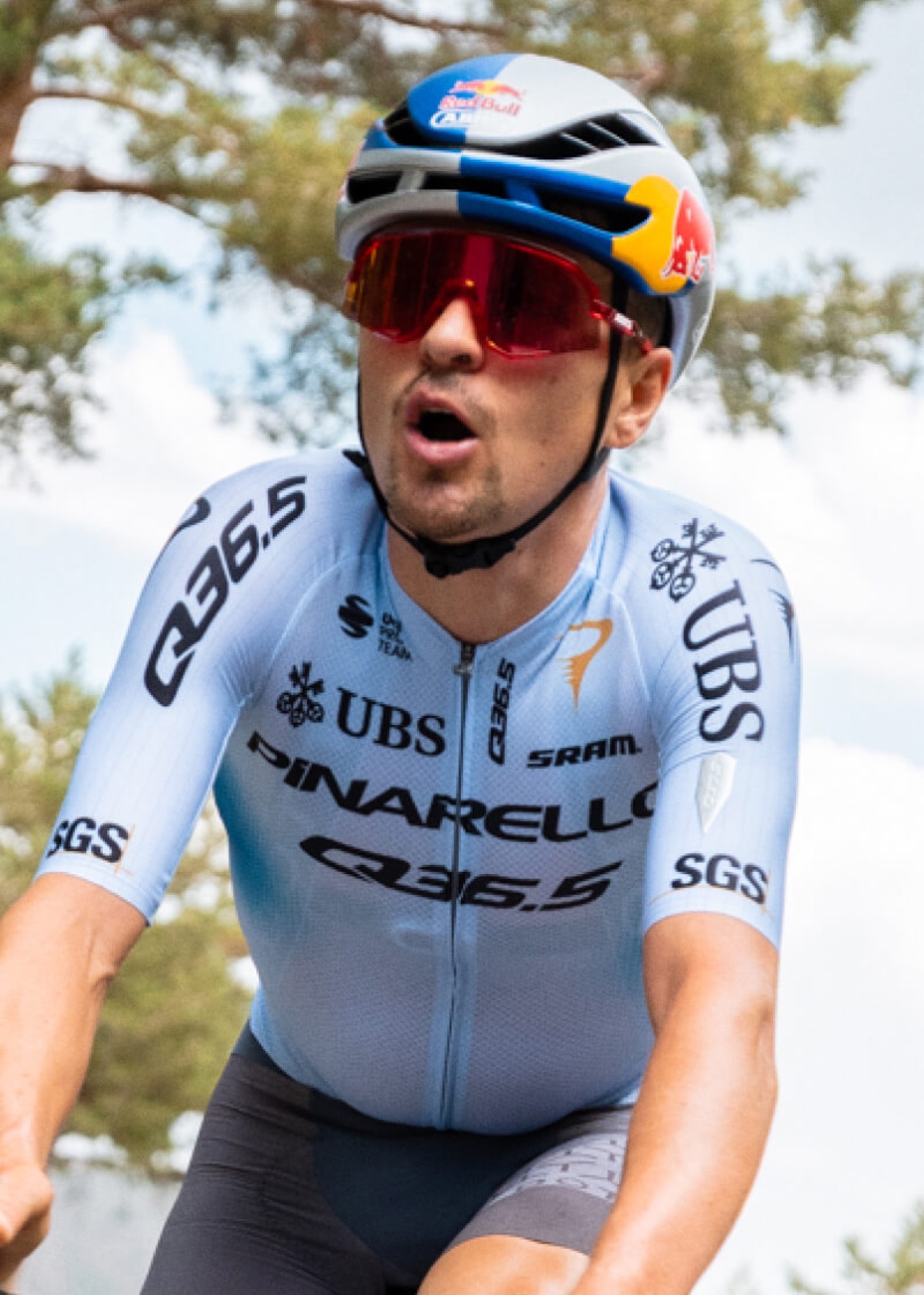 Q36.5 Pro Cycling Team rider in a lightweight summer jersey